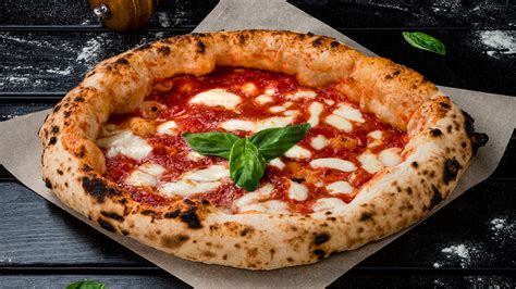 Graf s cenami pizze v Marchello