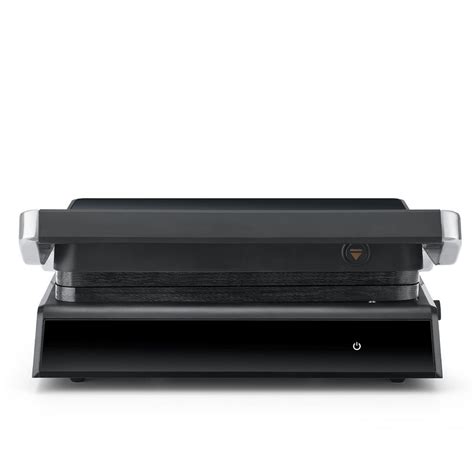 Detail rebrovaného povrchu grilovacej platne Philips s vizuálnym efektom ohňa