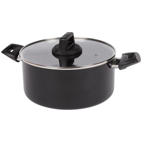 Hrniec s maslom počas procesu prepúšťania