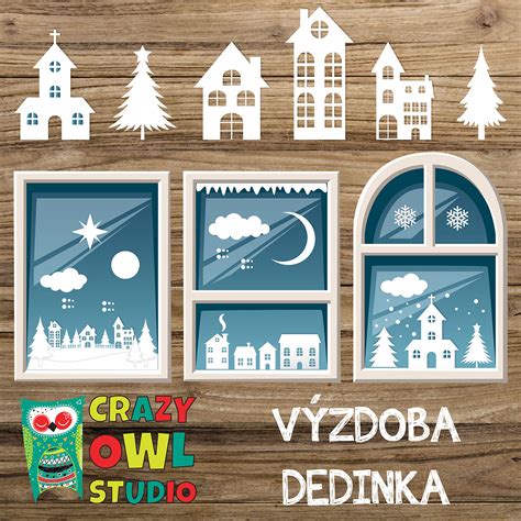 Zimná krajinka z papiera na okne