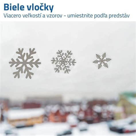 Vianočné papierové vločky na okne