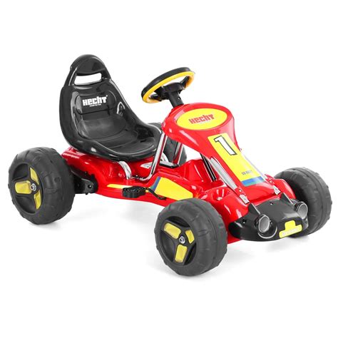 Dieťa jazdiace na šliapacej motokáre
