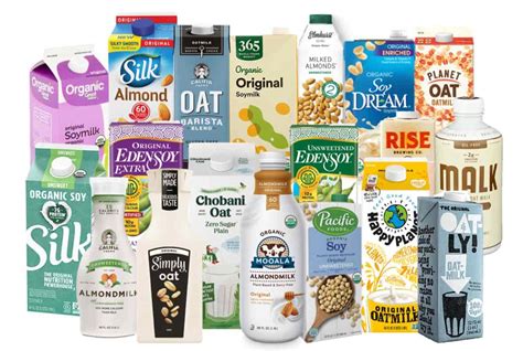 Different types of plant-based milks and creams on a kitchen counter