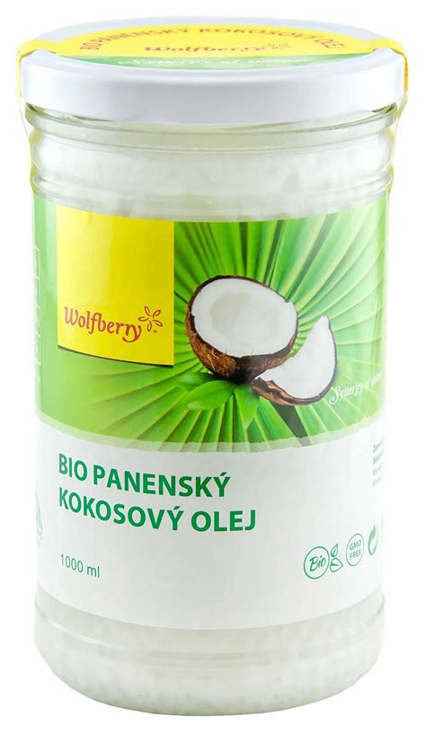 Kokosový olej v pohári a čerstvé kokosové orechy