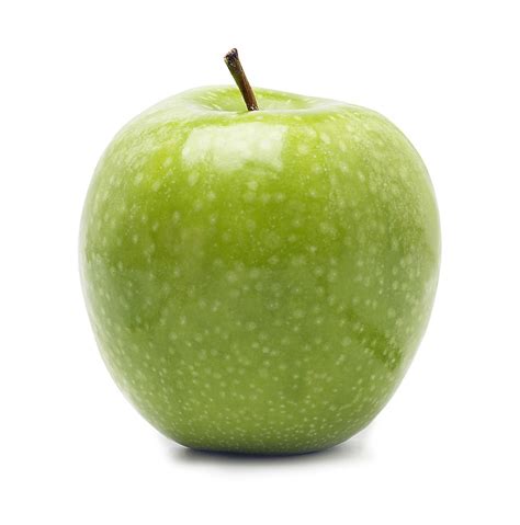 Zelené jablká Granny Smith na drevenej doske