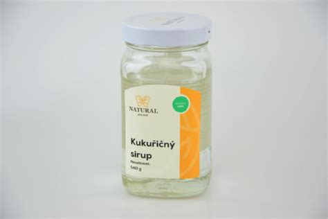 Zrnká kukurice a zlatistý kukuričný sirup