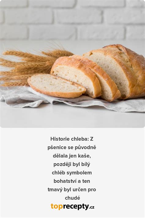 Zlatistý bochník chleba s klasmi pšenice