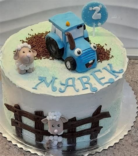 Ilustrácia torty s traktorom a farmárskymi zvieratkami